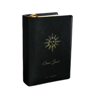 2026 celestial journal by St. Soleil | Black vegan leather journal with gold sun emblem and yellow interior