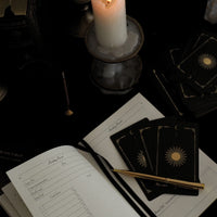 tarot journal preview with 3 tarot cards and pen