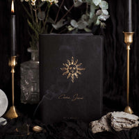 Black journal with sun design and 'Ceremonial Journal' text | 2026 Celestial Journal by St. Soleil