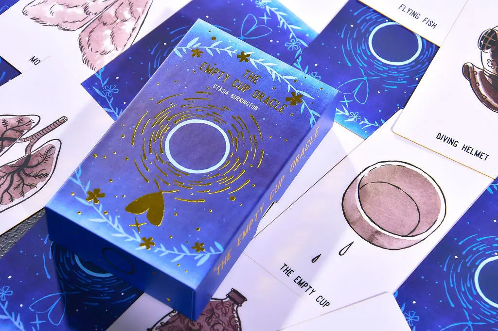 empty cup oracle deck on top of cards