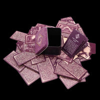 little light visions tarot cards with intricate designs on a black background