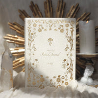 Decorative journal with gold floral patterns beige linen ritual journal