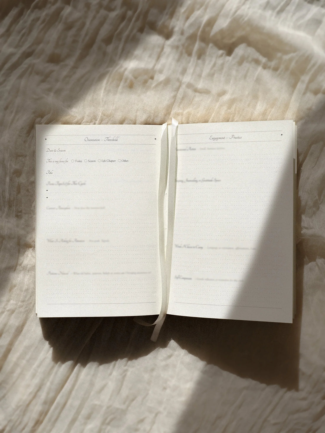 Open ritual journal with lined pages to take ritual notes