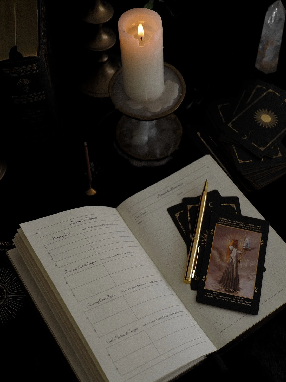 tarot journal preview with 3 tarot cards and pen