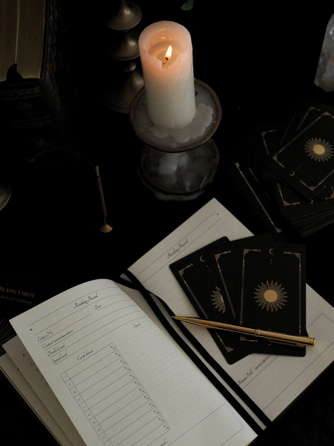 tarot journal preview with 3 tarot cards and pen 
