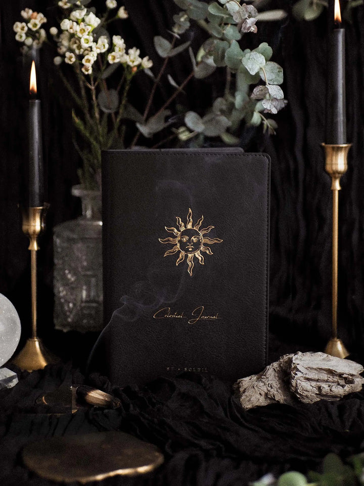 Black journal with sun design and 'Ceremonial Journal' text | 2026 Celestial Journal by St. Soleil