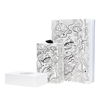 compos mentis tarot deck box and cards in front of the storybook