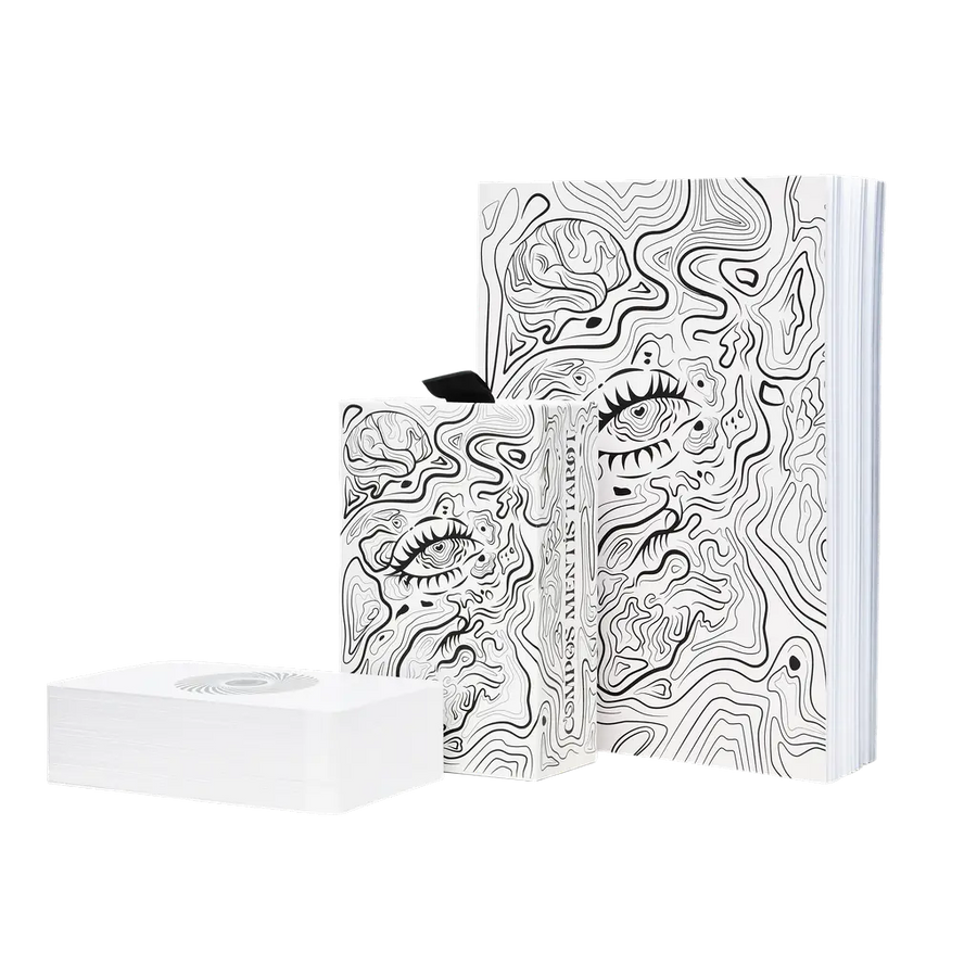 compos mentis tarot deck box and cards in front of the storybook