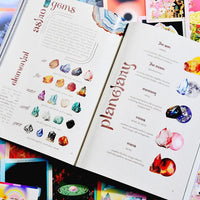 A preview of the magazine showing colorful crystal and gemstone illustrations with headings like 'astroid gems', 'elemental stones', and 'planetary'.
