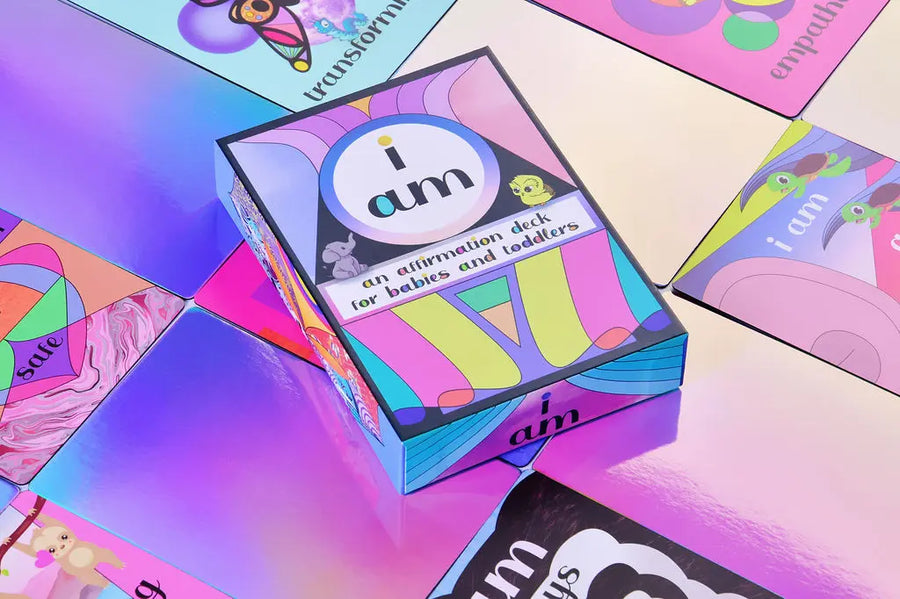 Colorful 'i am' affirmation cards on a vibrant background