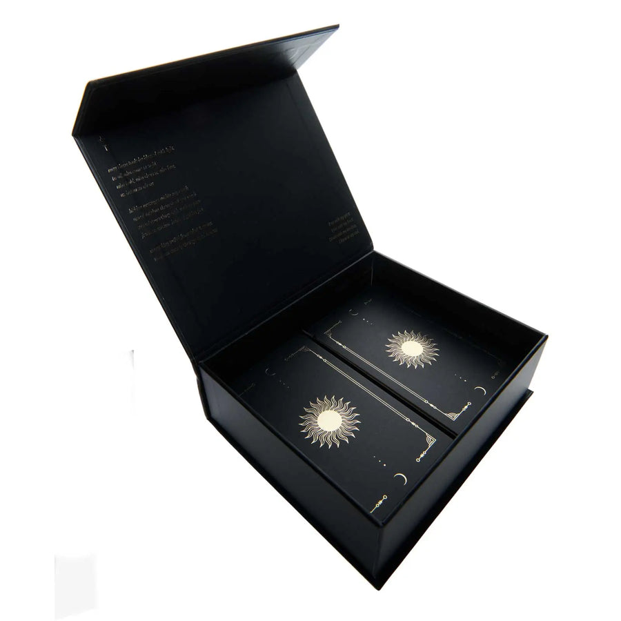 lucid dreams beginners tarot black eclipse • edition 4 • back of cards with gold foil inside the box