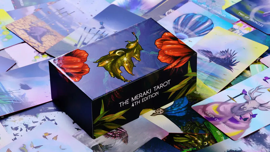 Meraki Tarot card box with tarot cards displayed around it